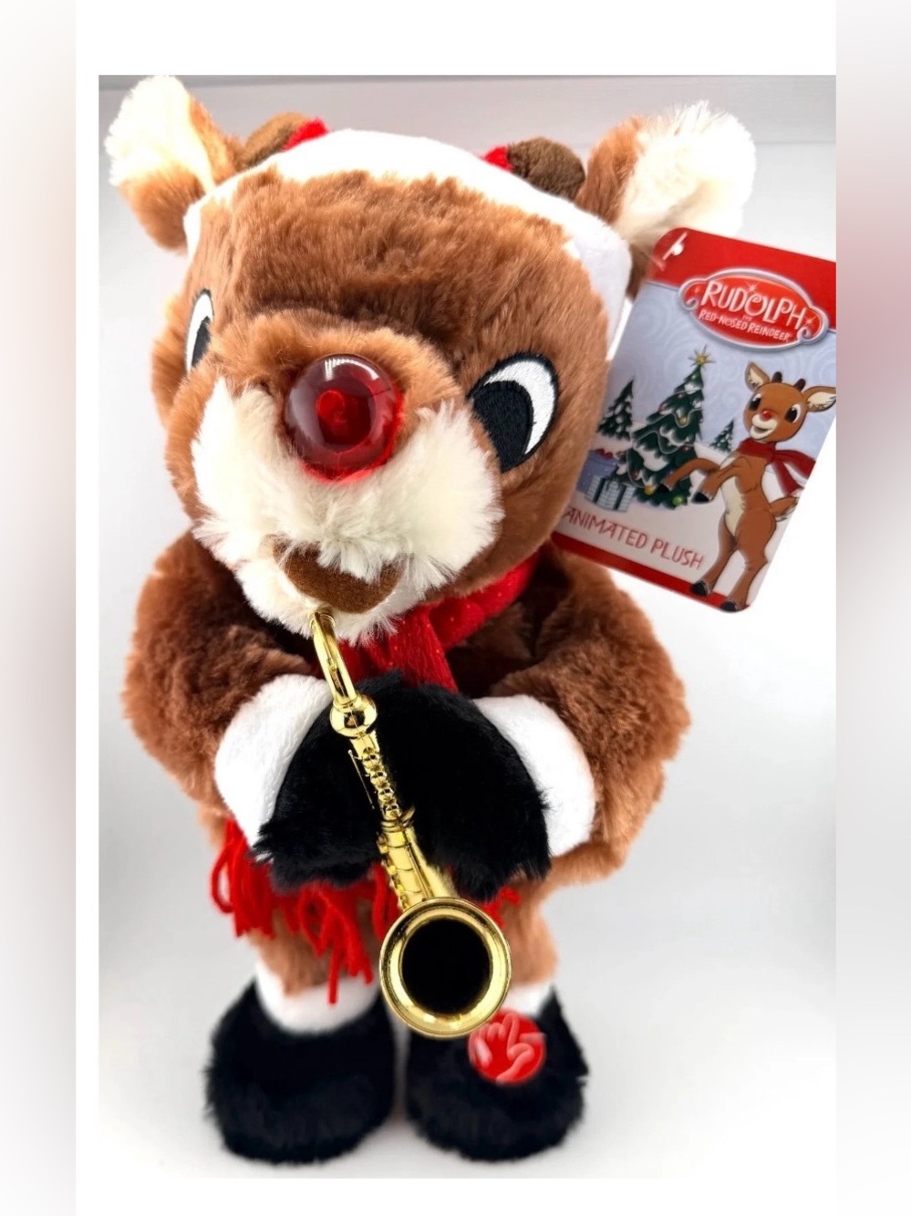 Rudolph Red-Nosed Reindeer Animated Plush - Holiday Toy plays saxophone new